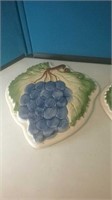 Pair of grape pottery trivets
