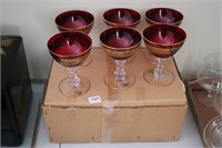 LOT OF RUBY GLASS STEMWARE WITH GOLD DESIGN