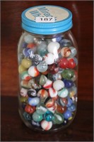 JAR OF GLASS MARBLES