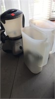 Cocoa-Latte maker.  Plastic pitchers.