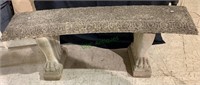 Antique curved concrete bench with lion paw feet