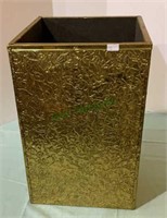 Vintage brass covered trash can. Measures 15 x 10