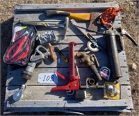 Pallet of misc. tools, axe, grease gun