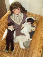 4 SIGNED EARLY DOLLS IN BASKET