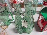 4- Coca Cola Bottles