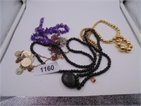 Assorted Necklaces - Black one is Vintage Locket