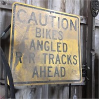 Caution Bikes Angled RR Tracks Ahead Sign