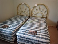 Two Twin Brass Accented Beds