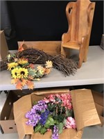 Silk flowers and wood shelf