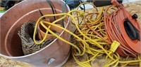 Assorted extension cords in plastic pot