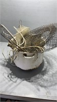 Metal pot with fishing nets