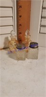 Antique perfume bottles and salt and pepper