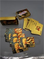 2 gold packs of Donald Trump playing cards
