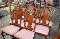 Eight Wood Padded Dining Chairs