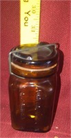 Amber jar with glass lid