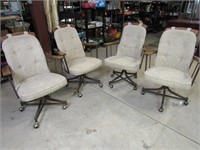 Set of (4) Tan Upholstered Rolling Chairs
