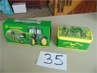 2 John Deere tins