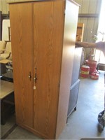 Pressed board storage cabinet