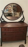 Vintage wood dresser with beveled edge mirror