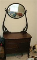 Vintage wood vanity with beveled edge mirror