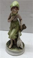 Figurine of lady with duck