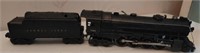 Black lionel train engine and car number 726
