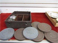 Old reel to reel movies w/metal cases.