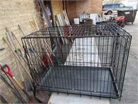 Folding metal pet cage. 22.25" by 36.75" by