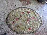 Antique floor rug. Oval. 57" by 40"