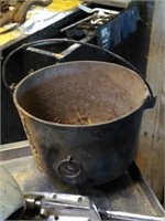 Medium size cast iron kettle.