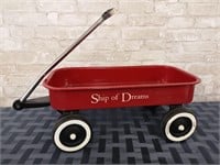 Red metal decorative wagon or doll wagon.