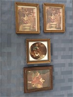 Four framed pictures.