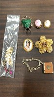 Brooch pins and souvenir bracelet