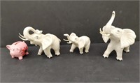 Vintage porcelain trunk-up elephants