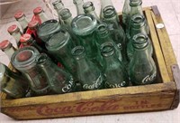 Yellow wood CocaCola case w/ bottles & Cokes