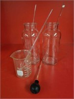 Glass beaker, stir sticks, syringe & 2 jars