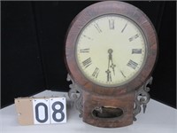 Clock with Roman numeral face