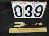 Very ornate gold tone serving fork