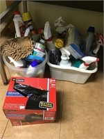 Cleaning Supplies And Partial Box Of Garbage Bags