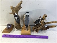 Carved wood bird wall hangings