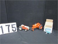3 toy tractors