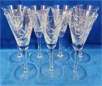 Seven designer cutglass wine glasses 8"