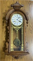 Vintage ornate antique-style wood wall clock
