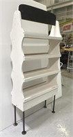White wood display shelf on industrial pipe legs