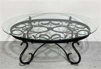 Glass top round metal motif coffee table