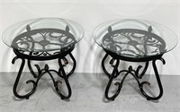 Pair glass top round metal motif end tables