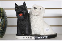 BLACK AND WHITE WHISKEY PLASTER ADVERTISING DOGS