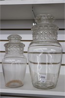 TWO GLASS CANISTERS WITH LIDS