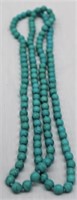 44" TURQUOISE COLORED BEADED NECKLACE