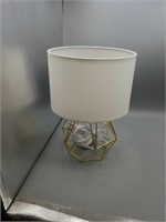 modern brass lamp with white lampshade